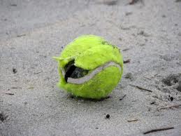 broken tennis ball