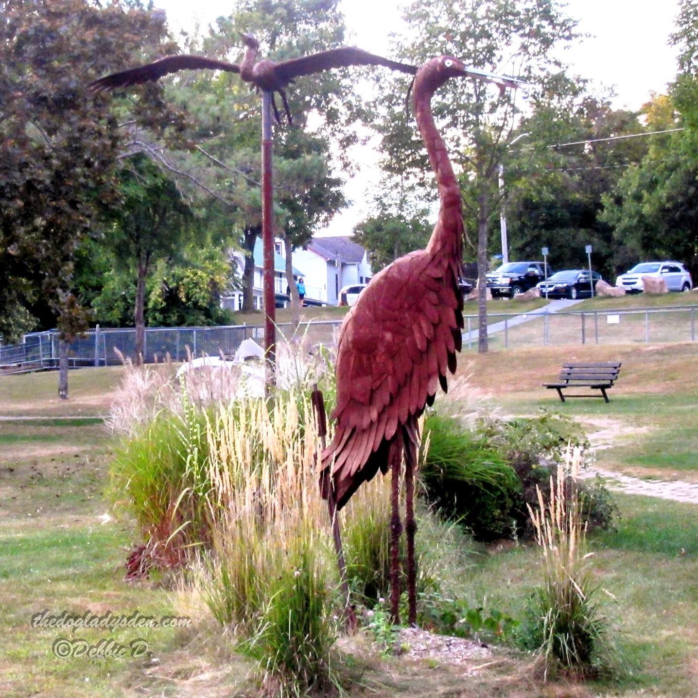 crane bird sculptures in gananoque